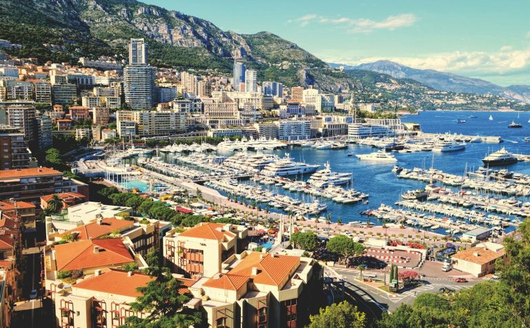 Authentic luxury superyachts anchored at Port Hercule during Monaco Yacht Show